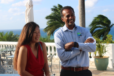 Dr. Carey Wallace, CEO- Tourism Enhancement Funds and his wife shares a warm moment at Jamaica Open Media briefing at Tryall Golf Club